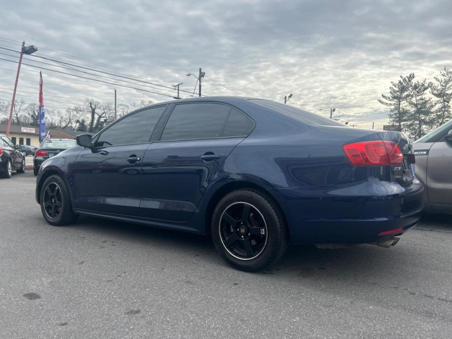 2014 BLUE VOLKSWAGEN JETTA BASE (3VW2K7AJ2EM) with an 2.0L engine, Automatic transmission, located at 2514 Williamson Rd NE, Roanoke, VA, 24012, (540) 265-7770, 37.294636, -79.936249 - NO CREDIT CHECK FINANCING WITH ONLY $2200 DOWN PAYMENT!!!! Check out our website www.needausedvehicle.com for our No Credit Check/ In House Financing options!! No Credit Check Available!!! In House Financing Available!!! All Clean Title Vehicles (no Salvaged or flooded vehicles ever on our lot)! - Photo#1