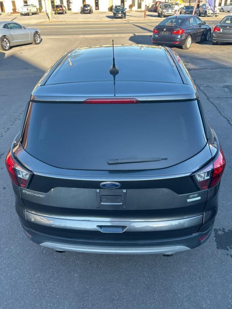 2019 GRAY FORD ESCAPE SE (1FMCU0GD2KU) with an 1.5L engine, Automatic transmission, located at 2514 Williamson Rd NE, Roanoke, VA, 24012, (540) 265-7770, 37.294636, -79.936249 - NO CREDIT CHECK FINANCING WITH ONLY $3700 DOWN PAYMENT!!!! Check out our website www.needausedvehicle.com for our No Credit Check/ In House Financing options!! No Credit Check Available!!! In House Financing Available!!! All Clean Title Vehicles (no Salvaged or flooded vehicles ever on our lot)! - Photo#11