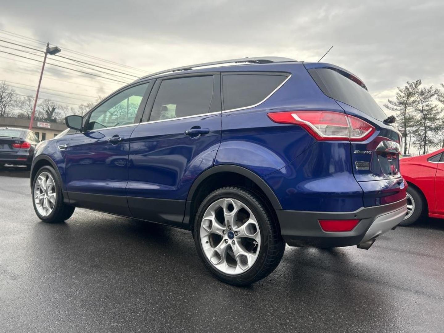 2014 BLUE FORD ESCAPE TITANIUM (1FMCU9J97EU) with an 2.0L engine, Automatic transmission, located at 2514 Williamson Rd NE, Roanoke, VA, 24012, (540) 265-7770, 37.294636, -79.936249 - NO CREDIT CHECK FINANCING WITH ONLY $3200 DOWN PAYMENT!!!! Check out our website www.needausedvehicle.com for our No Credit Check/ In House Financing options!! No Credit Check Available!!! In House Financing Available!!! All Clean Title Vehicles (no Salvaged or flooded vehicles ever on our lot)! - Photo#1