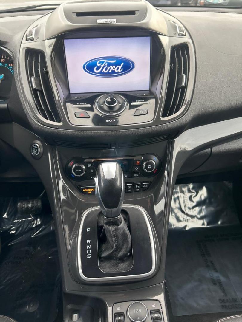 2014 BLUE FORD ESCAPE TITANIUM (1FMCU9J97EU) with an 2.0L engine, Automatic transmission, located at 2514 Williamson Rd NE, Roanoke, VA, 24012, (540) 265-7770, 37.294636, -79.936249 - NO CREDIT CHECK FINANCING WITH ONLY $3200 DOWN PAYMENT!!!! Check out our website www.needausedvehicle.com for our No Credit Check/ In House Financing options!! No Credit Check Available!!! In House Financing Available!!! All Clean Title Vehicles (no Salvaged or flooded vehicles ever on our lot)! - Photo#7