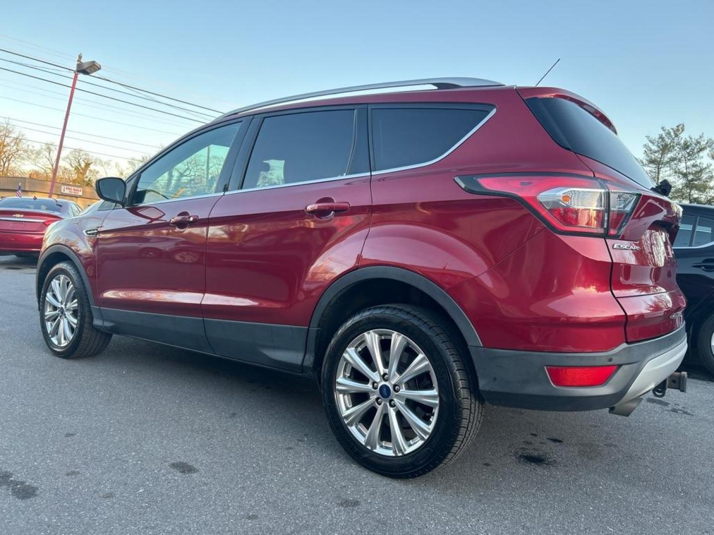 2017 RED FORD ESCAPE TITANIUM (1FMCU9J94HU) with an 2.0L engine, Automatic transmission, located at 2514 Williamson Rd NE, Roanoke, VA, 24012, (540) 265-7770, 37.294636, -79.936249 - NO CREDIT CHECK FINANCING WITH ONLY $3300 DOWN PAYMENT!!!! Check out our website www.needausedvehicle.com for our No Credit Check/ In House Financing options!! No Credit Check Available!!! In House Financing Available!!! All Clean Title Vehicles (no Salvaged or flooded vehicles ever on our lot)! - Photo#1